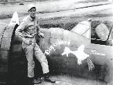 Howard R. Oglesby with his P-47 fighter.