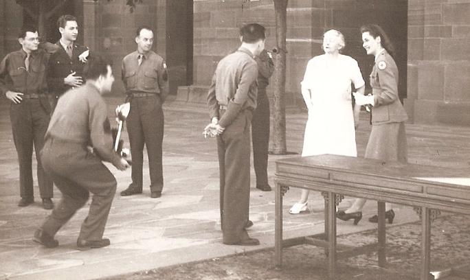 Lady Wavell, wife of the Viceroy, chatting with GIs and a hostess of the Red Cross club who had helped arrange a tour of the Viceroy's Palace in New Delhi.
